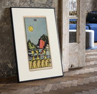 Figure walking away from eight cups print in a black frame leaning beside a vintage door on parquet