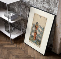 Blindfolded bound woman among swords poster in a black frame leaning beside a shelf in a raw-plaster loft