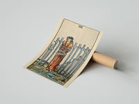 Gently curled Eight of Swords print beside its protective shipping tube