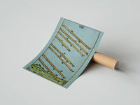 Gently curled Eight of Wands print beside its protective shipping tube