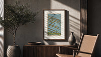 Eight flying wands over landscape poster framed above a fluted sideboard beside an olive tree