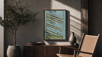 Eight of Wands poster framed above a fluted sideboard beside a potted tree