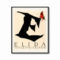 Framed Butterfly on giant letter E print shown as a bold statement piece on a clean gallery wall