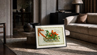 Christmas sled with holly and ribbon print in a slim black frame leaning on a travertine coffee table