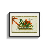 Framed Christmas sled with holly and ribbon print shown as a wide statement piece on a clean white wall