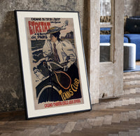 Woman on bicycle with tennis racket print in a black frame leaning beside a vintage door on parquet