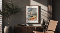 Sailboats on alpine lake bay poster framed above a fluted sideboard beside an olive tree