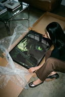 The Anime boy with green eye poster shown across its range of print sizes