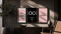 Chanel Wall Art Set triptych in three walnut frames above a sideboard in a warm room