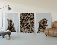 Leopard Print Wall Art Set three-panel set displayed beside a brown leather sofa