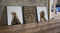 Leopard Print Wall Art Set three-piece set leaning on parquet beside a vintage loft door