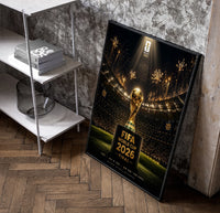 FIFA World Cup trophy on pedestal poster in a black frame leaning beside a shelf in a raw-plaster loft
