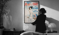 Fight or Buy Bonds Third Liberty Loan print on the floor, leaning against a travertine table