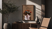 Fist with a Blue Gemstone Ring poster framed above a fluted sideboard beside a potted tree