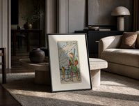 Man collecting swords by shore print in a black frame leaning on a travertine table in a sunlit lounge