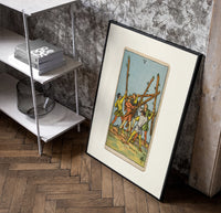 Five men fighting with staves poster in a black frame leaning beside a shelf in a raw-plaster loft