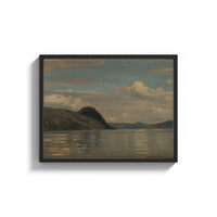 Framed Coastal fjord landscape with headland print shown as a wide statement piece on a clean white wall