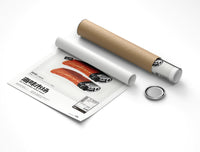 Flat lay of rolled SEAxFOOD Market print beside open cardboard tube and cap on white background
