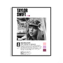 Flat lay of Taylor Swift 1989 biography poster in a black frame resting on a light surface