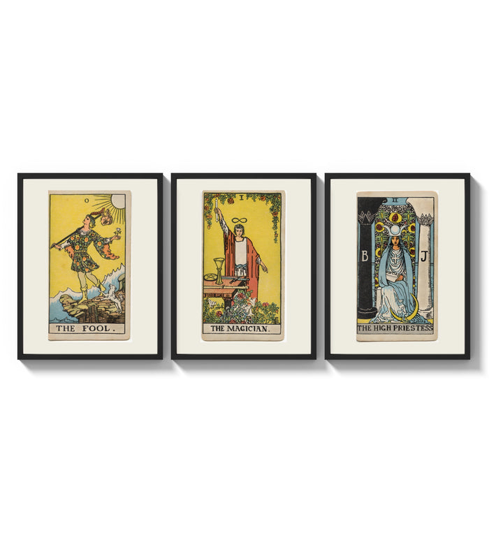 Three 1909 tarot cards three-panel set arranged as a triptych on a bright gallery wall