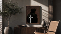 Forgiven Cross Hoodie poster framed above a fluted sideboard beside a potted tree