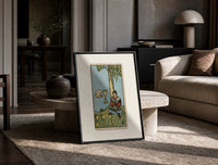 Seated man under tree with cups print in a black frame leaning on a travertine table in a sunlit lounge