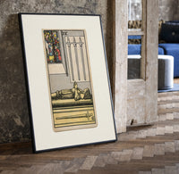 Effigy of knight with three swords print in a black frame leaning beside a vintage door on parquet
