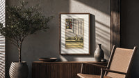 Effigy of knight with three swords poster framed above a fluted sideboard beside an olive tree