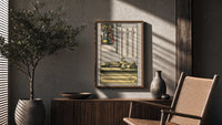 Four of Swords poster framed above a fluted sideboard beside a potted tree