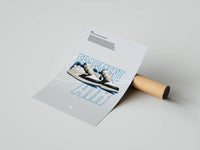 Fragment Air Jordan 1 panel with blue FRAGMENT AIR outline text and shoe graphic unrolled beside a cardboard tube