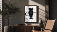 KAWS Chum figure with swoosh line framed poster on white poster framed above a fluted sideboard beside an olive tree