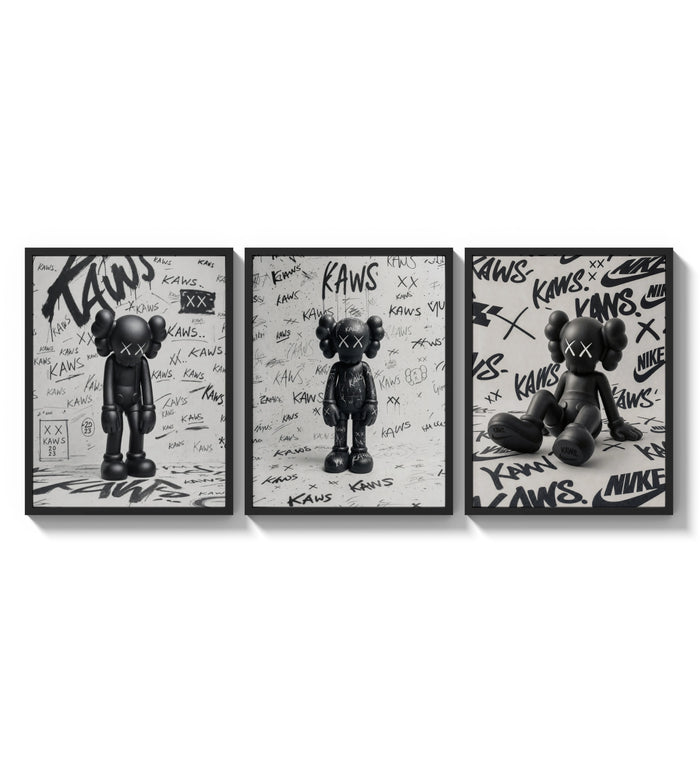 KAWS black and white graffiti framed poster set of 3 three-panel set arranged as a triptych on a bright gallery wall
