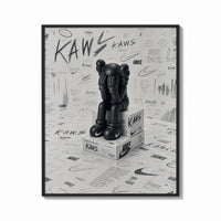 Framed Black KAWS Companion on Nike shoeboxes framed sketch poster print shown as a bold statement piece on a clean…