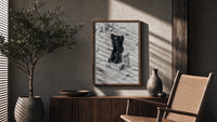 Black KAWS Companion on Nike shoeboxes framed sketch poster poster framed above a fluted sideboard beside an olive tree