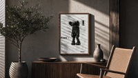 KAWS Companion technical spec sheet framed poster on cream poster framed above a fluted sideboard beside an olive tree