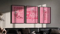Pink furry KAWS Companion framed poster set of 3 triptych in three black frames on a grey wall above a leather sofa