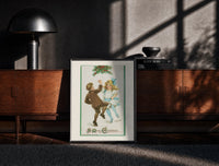 Black-framed Frances Brundage Dancing Children print on the floor in front of a dark wooden console
