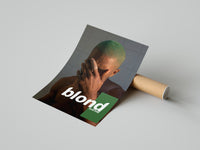 Close-up of the Frank Ocean Blond print being unrolled on a concrete surface revealing wet skin texture detail