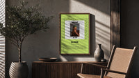 Man covering face album cover poster framed above a fluted sideboard beside an olive tree