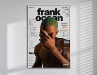 Frank Ocean with green hair poster in a slim frame on a bright wall with soft window light
