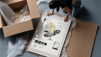 French 75 Cocktail Market framed print being unpacked from protective bubble wrap and a box