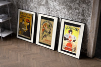Vintage French aperitif advertisements trio set of three black-framed prints leaning against a raw-plaster wall