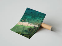 Rolled Seaside tennis court by ocean poster beside its crush-resistant kraft shipping tube