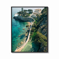 Framed Cliffside coastal luxury villa estate print shown as a bold statement piece on a clean gallery wall