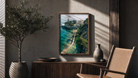 Cliffside coastal luxury villa estate poster framed above a fluted sideboard beside an olive tree