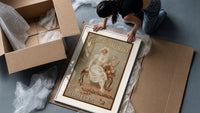 Elegant woman in white dress framed print being unpacked from protective bubble wrap and a box