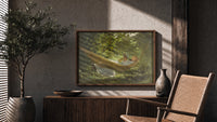 Girl reading in a hammock print in a wood frame above a fluted sideboard beside an olive tree