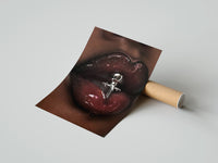 Gently curled Glossy Lips with a Silver Charm print beside its protective shipping tube