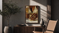 Gold Nails and a Stemmed Glass poster framed above a fluted sideboard beside a potted tree