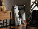 Walnut-framed Anime boy with backpack and fishing rod print leaning against a sunlit rustic brick wall